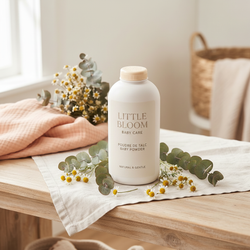 Little Bloom Baby Care Poudre de Talc Baby Powder large white bottle with cream cap on linen cloth with chamomile and eucalyptus